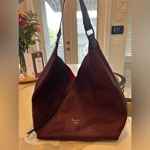 Red shoulder bag.